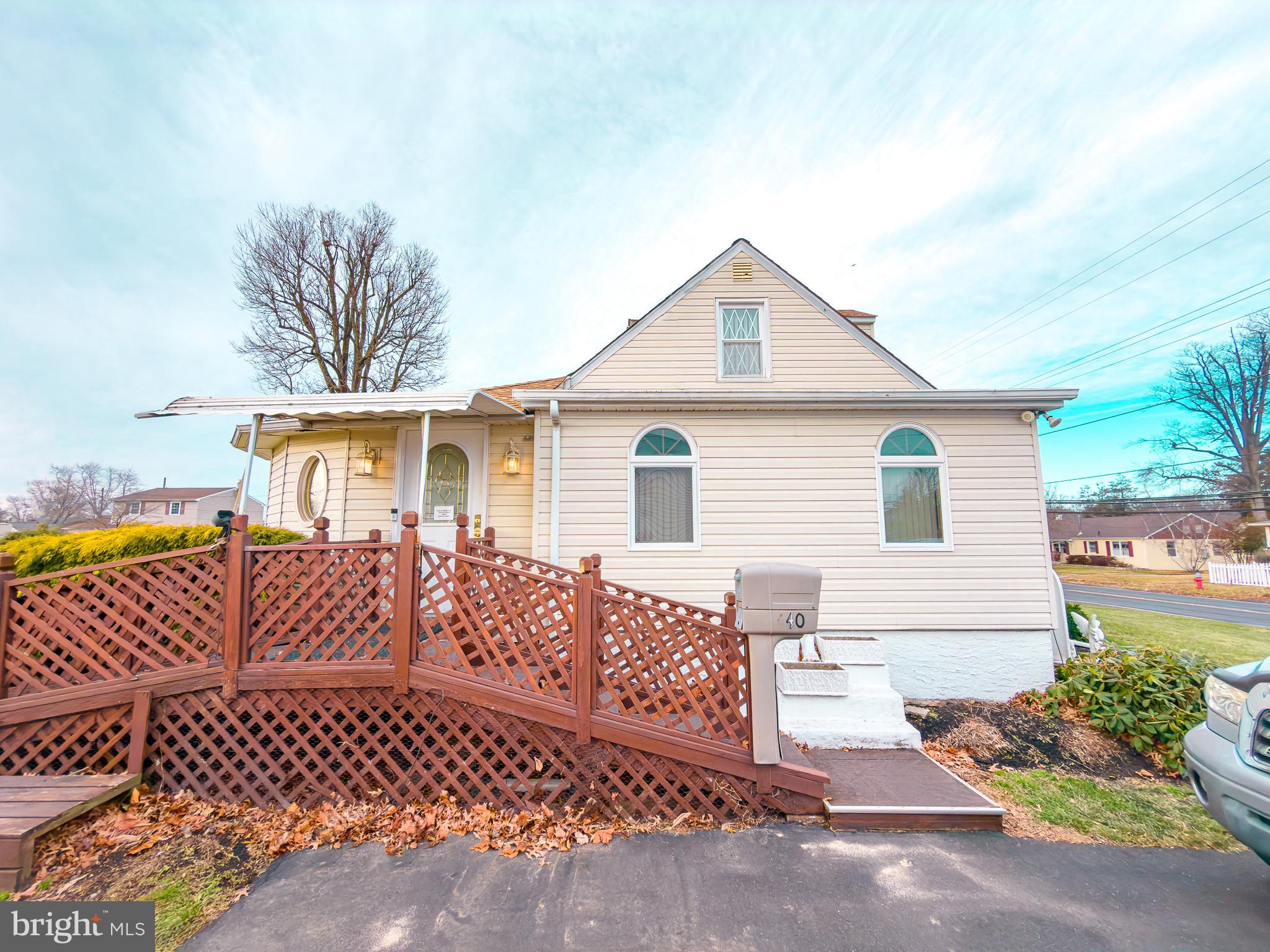 440 Durham Road Langhorne, PA 19047 - Photo 5 of 23 a view of a house with a wooden deck