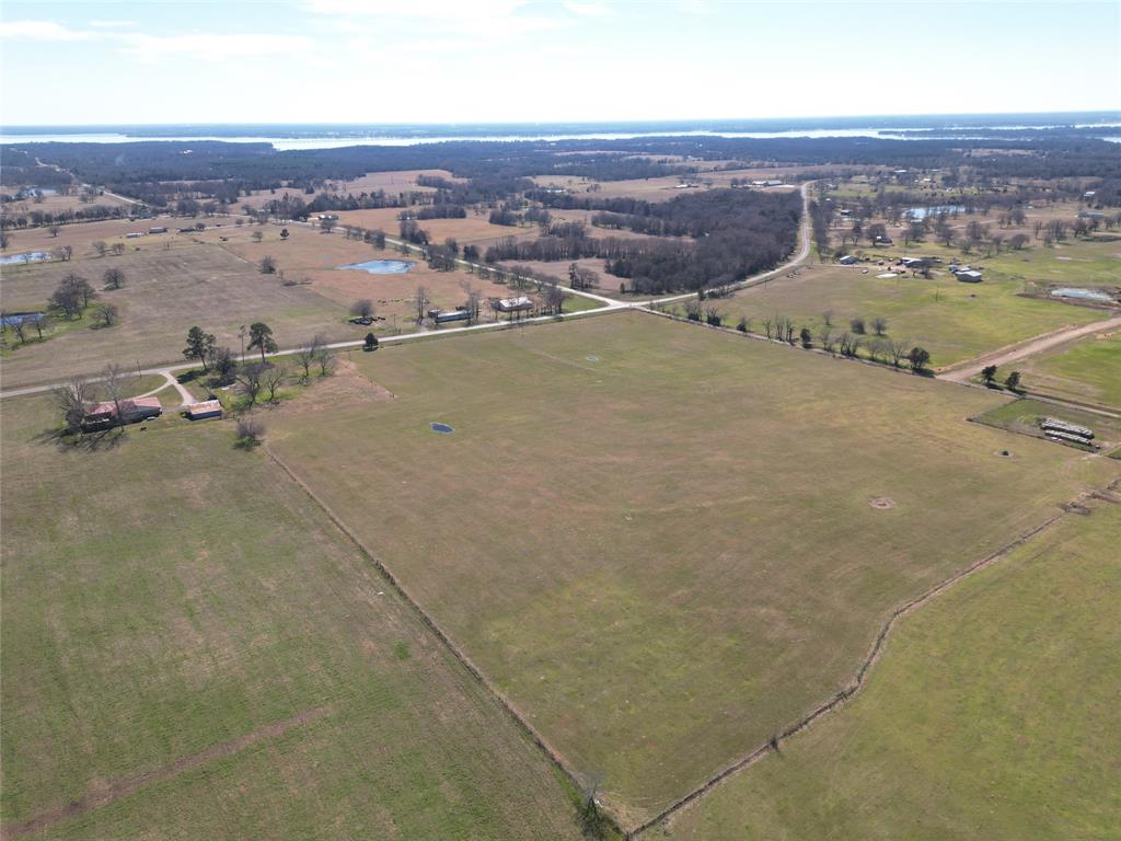 an aerial view of a house with a outdoor space