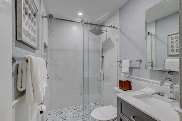 a bedroom with a bed and a fireplace