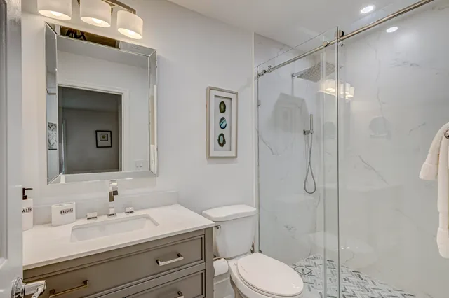 a view of a street with a ocean view