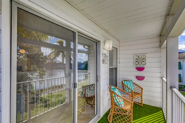 a view of a house with swimming pool and a yard