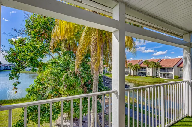 a view of livingroom with furniture and floor to ceiling window