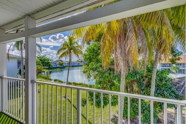 a view of swimming pool from a garden
