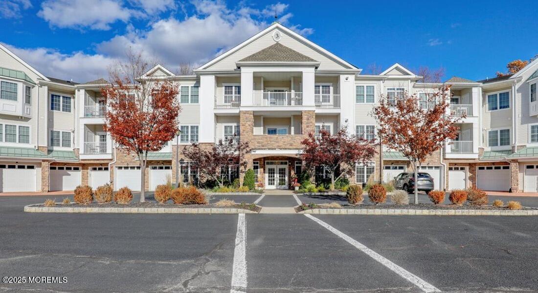 3205 Falston Circle Old Bridge, NJ 08857 - Photo 12 of 44 a front view of a building with a street