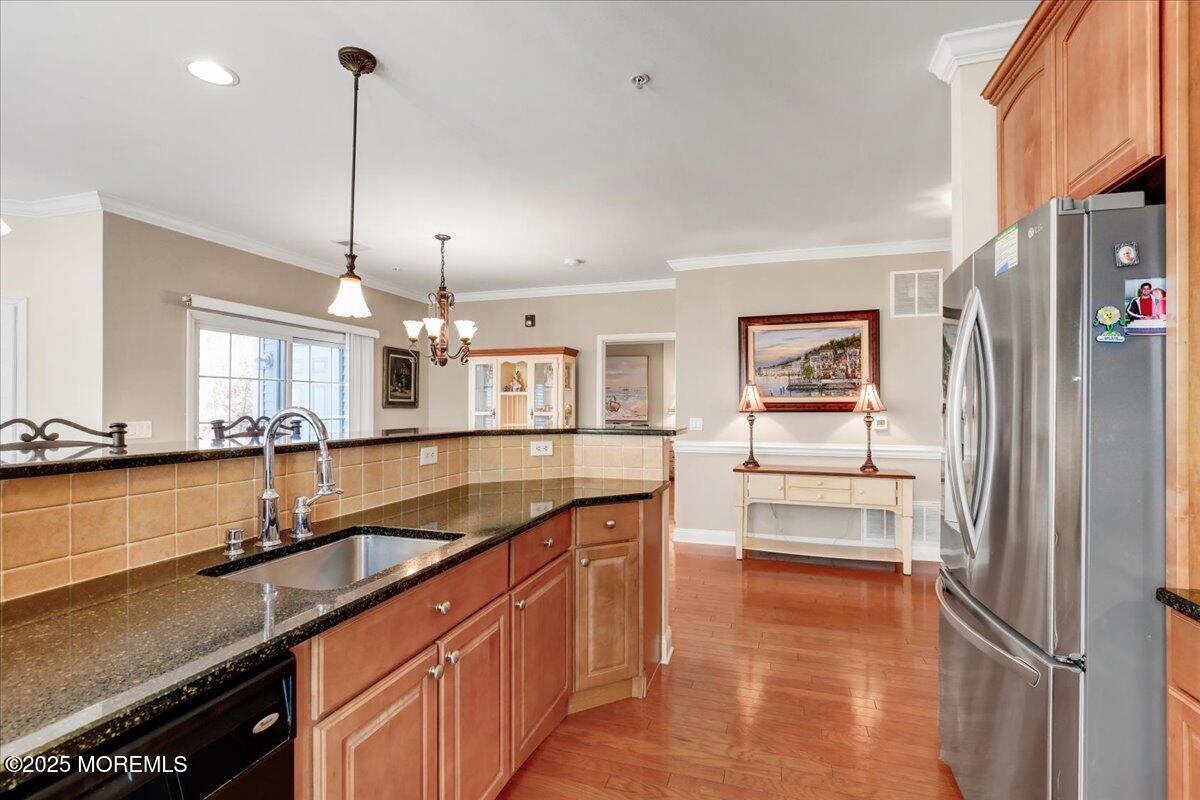 3205 Falston Circle Old Bridge, NJ 08857 - Photo 16 of 44 a kitchen with stainless steel appliances granite countertop a sink refrigerator and cabinets