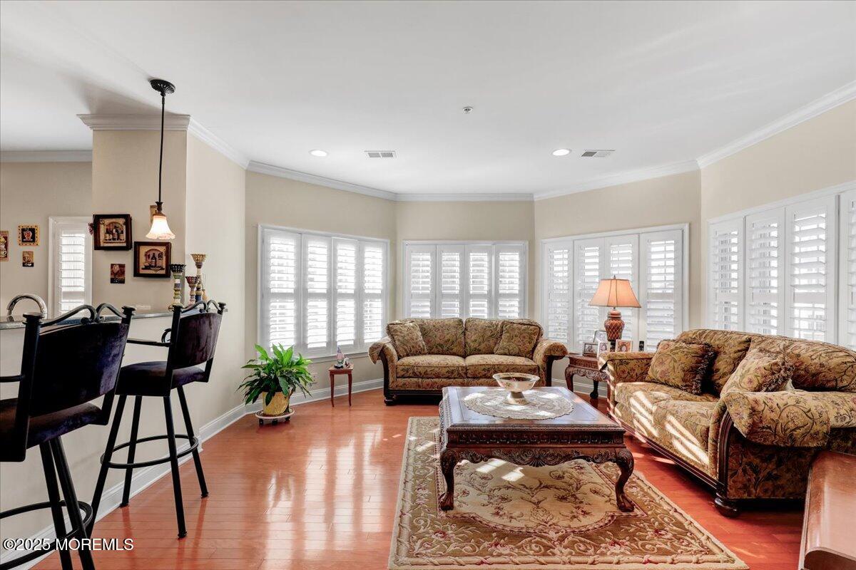 3205 Falston Circle Old Bridge, NJ 08857 - Photo 20 of 44 a living room with furniture wooden floor and a large window