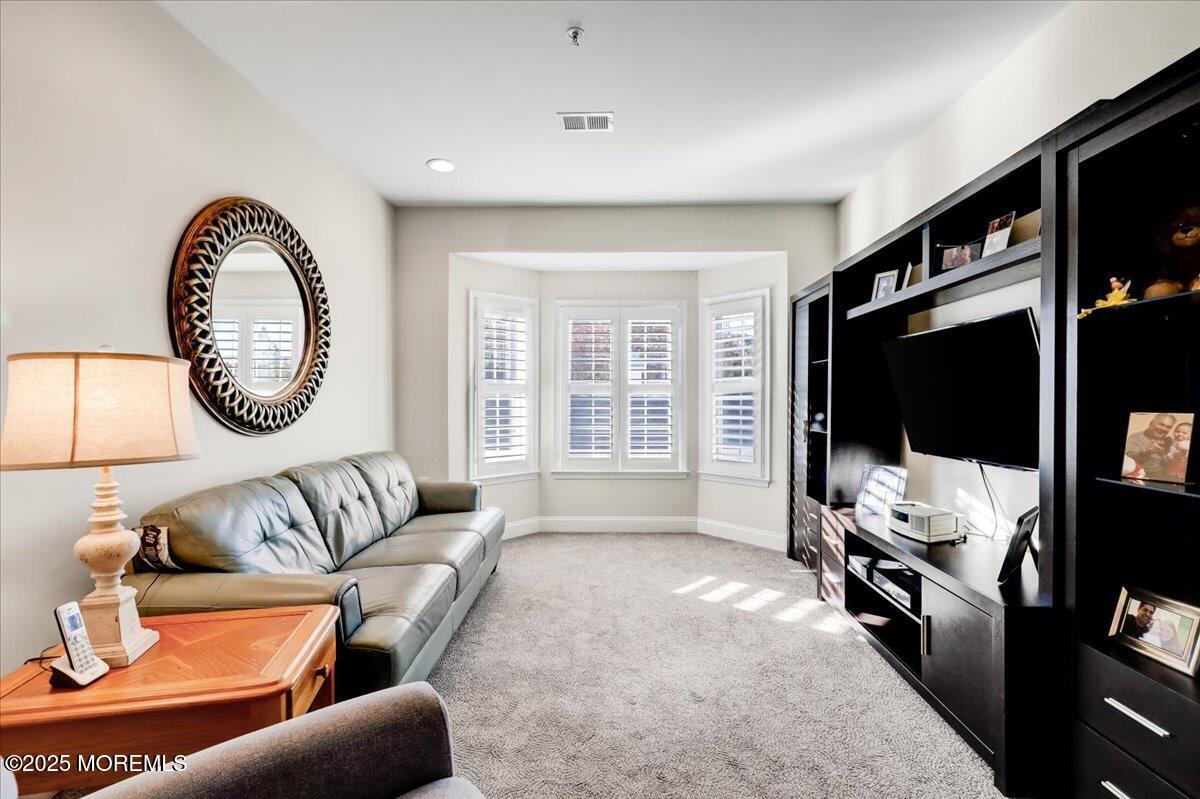 3205 Falston Circle Old Bridge, NJ 08857 - Photo 22 of 44 a living room with furniture and a flat screen tv