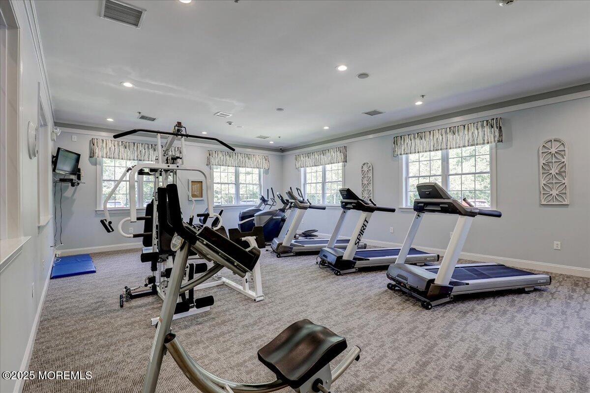 3205 Falston Circle Old Bridge, NJ 08857 - Photo 37 of 44 a room with gym equipment and windows