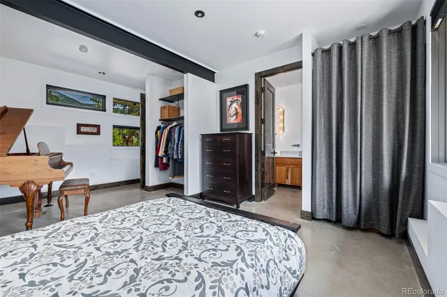 a bathroom with a sink a large mirror and a shower