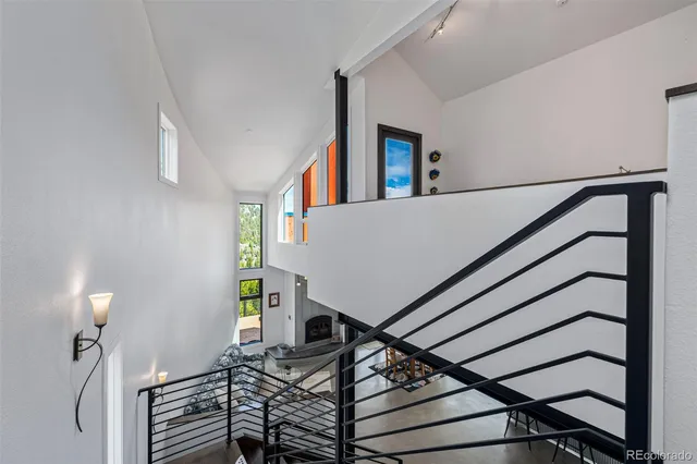 a view of a workspace with furniture and toys