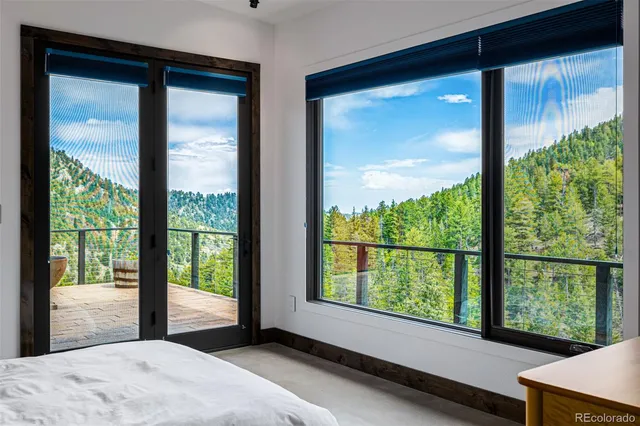 a view of an house with porch and sitting area