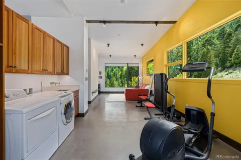 a view of a hallway with utility room