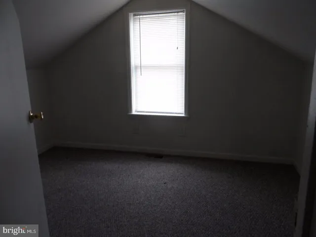 a bathroom with a sink toilet and mirror