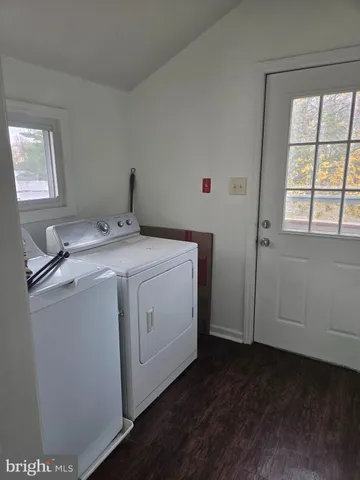 a view of balcony with wooden floor