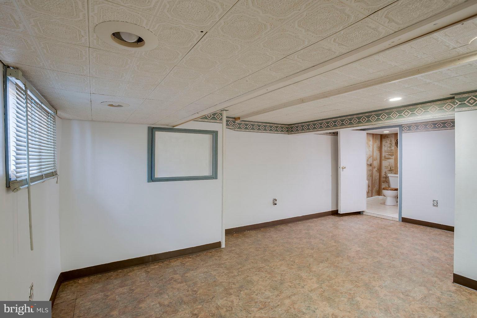 4709 Pilgrim Road Baltimore, MD 21214 - Photo 34 of 44 Lower level living space w walkout