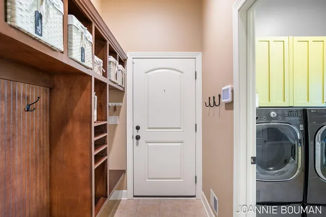 $929,900 | 15611 River Woods, West Olive, MI 49460