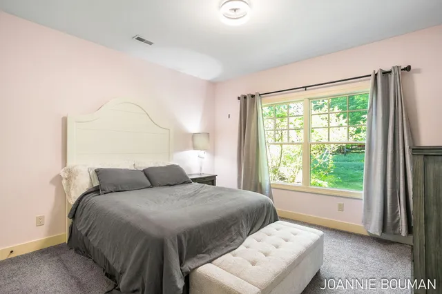 $929,900 | 15611 River Woods, West Olive, MI 49460