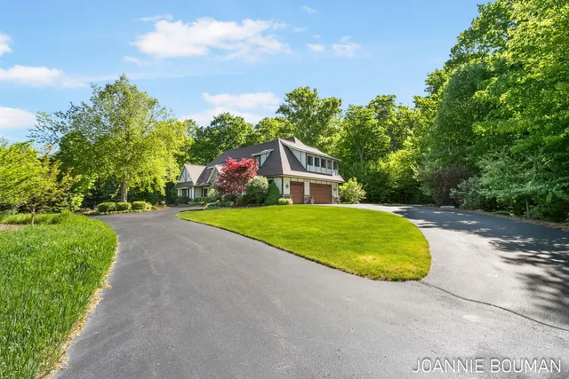 $929,900 | 15611 River Woods, West Olive, MI 49460