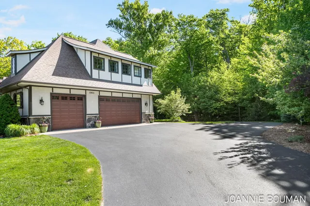 $929,900 | 15611 River Woods, West Olive, MI 49460