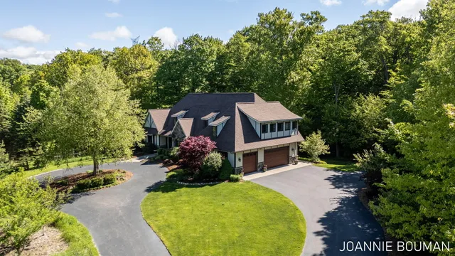 $929,900 | 15611 River Woods, West Olive, MI 49460