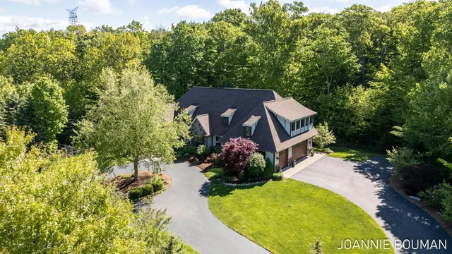 $929,900 | 15611 River Woods, West Olive, MI 49460