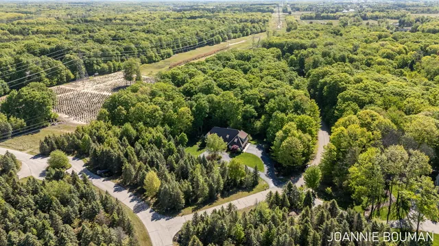 $929,900 | 15611 River Woods, West Olive, MI 49460