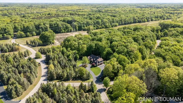 $929,900 | 15611 River Woods, West Olive, MI 49460