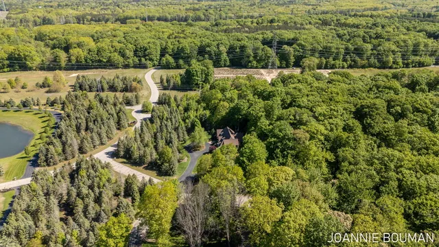 $929,900 | 15611 River Woods, West Olive, MI 49460