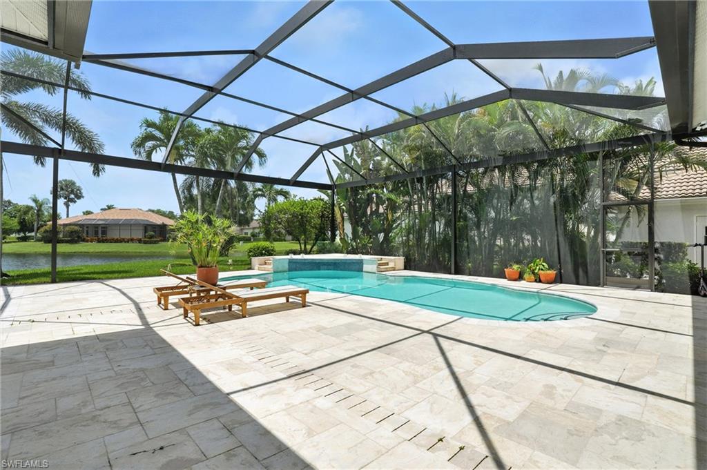 581 Wedgewood Way Naples, FL 34119 - Photo 25 of 33 a view of park with a patio