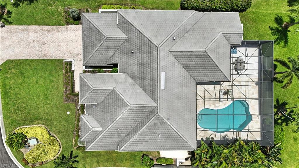 581 Wedgewood Way Naples, FL 34119 - Photo 29 of 33 an aerial view of a house having yard