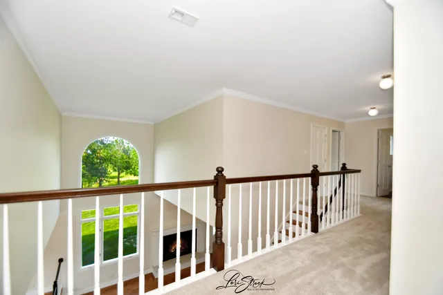 a view of livingroom with window and a ceiling fan
