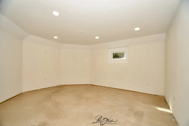 an empty room with closet area