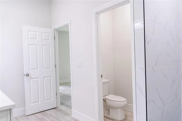 a bathroom with a toilet