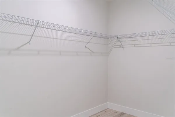 a view of a room with racks on the wall