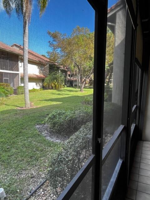 5520 Coach House Circle, Unit A Boca Raton, FL 33486 - Photo 21 of 101 Patio looking east 2