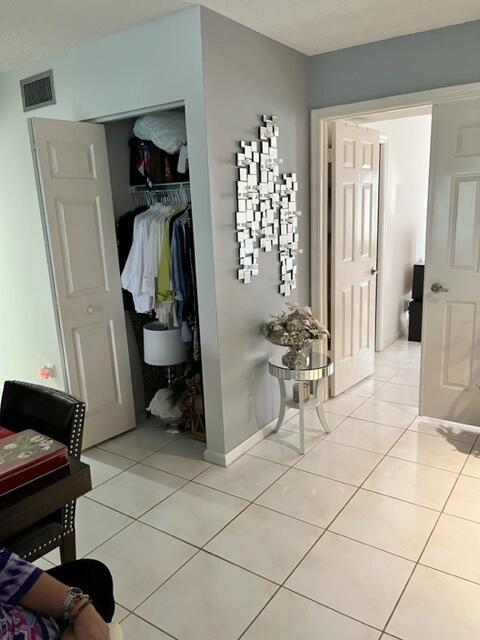 5520 Coach House Circle, Unit A Boca Raton, FL 33486 - Photo 50 of 101 Hall Closet-guest bdrm