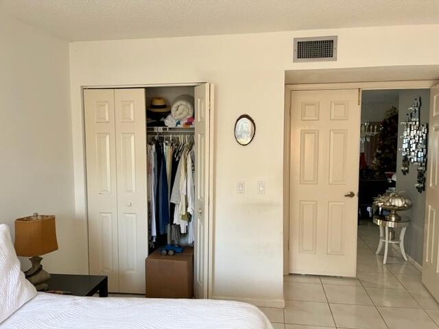 5520 Coach House Circle, Unit A Boca Raton, FL 33486 - Photo 51 of 101 Guest Closet-view lv rm