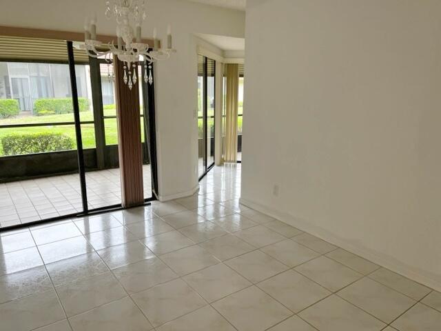 5520 Coach House Circle, Unit A Boca Raton, FL 33486 - Photo 69 of 101 patiopass to kitchen
