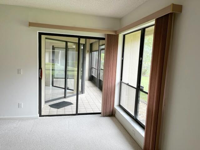 5520 Coach House Circle, Unit A Boca Raton, FL 33486 - Photo 75 of 101 Mstr door to patio