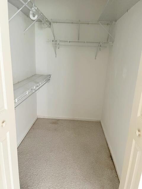 5520 Coach House Circle, Unit A Boca Raton, FL 33486 - Photo 77 of 101 Mstr walk-in closet
