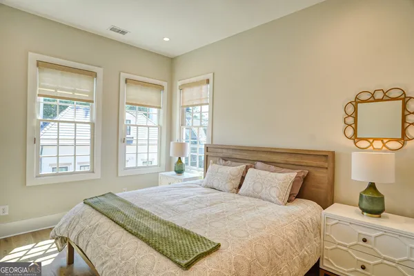 a view of a hallway with a living room