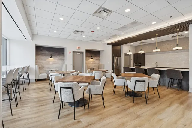 a view of a dining room with furniture