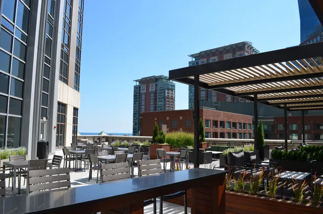 a view of dinning table and chairs in patio