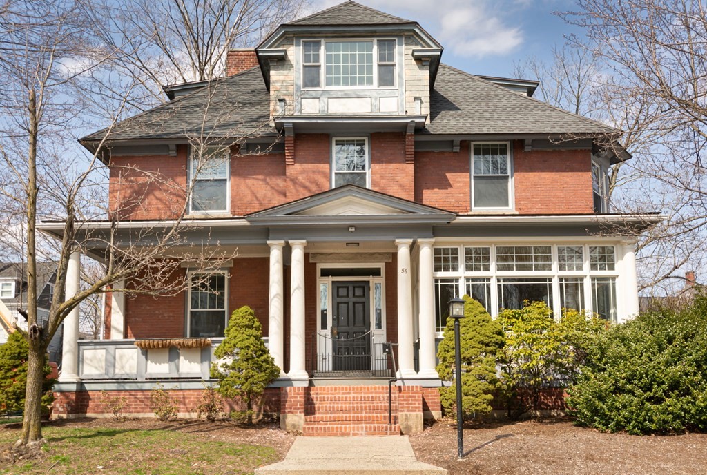 56 William Street Worcester, MA 01609 - Photo 1 of 37 a front view of a house with garden