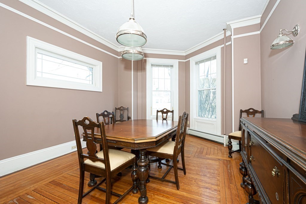 56 William Street Worcester, MA 01609 - Photo 13 of 37 a view of a dining room with furniture window and wooden floor