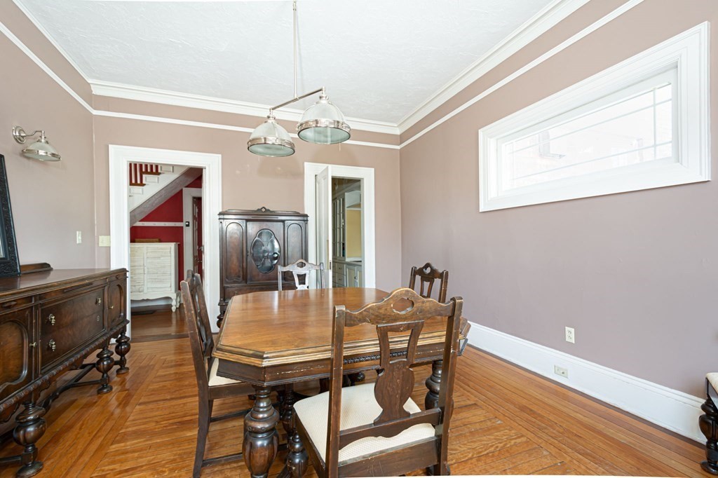 56 William Street Worcester, MA 01609 - Photo 14 of 37 a view of a dining room with furniture and a chandelier