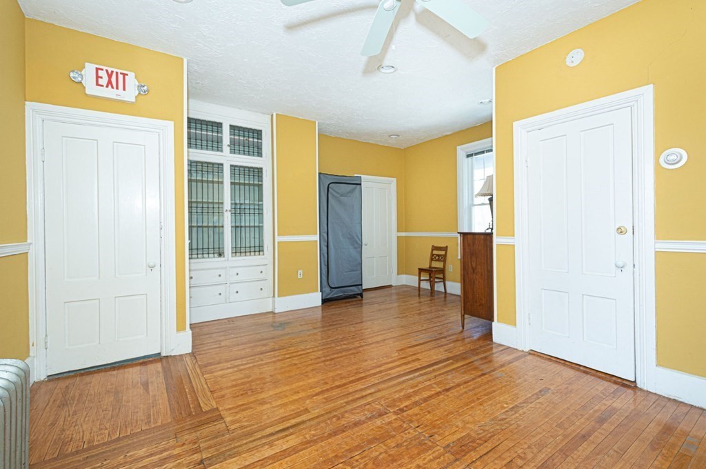 56 William Street Worcester, MA 01609 - Photo 16 of 37 a view of empty room with wooden floor