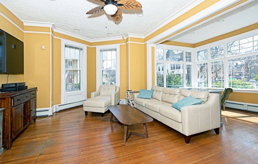 56 William Street Worcester, MA 01609 - Photo 3 of 37 a living room with furniture and a large window