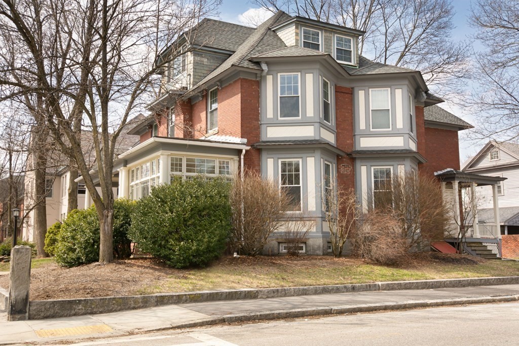 56 William Street Worcester, MA 01609 - Photo 33 of 37 a front view of a house with a yard