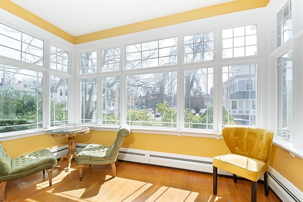 56 William Street Worcester, MA 01609 - Photo 5 of 37 a living room with furniture and a large window